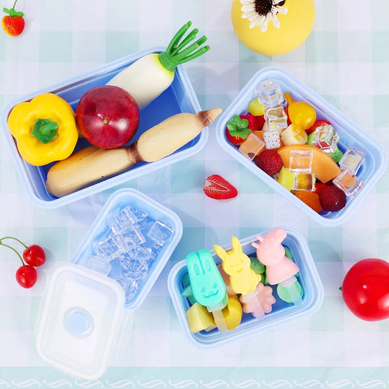 Tápers con fruta y snacks para la lonchera